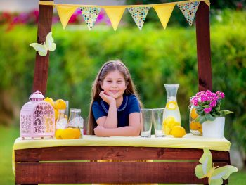 Young girl at her lemonade stand