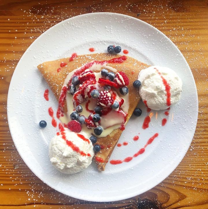 plate of berry crepes from whisk crepes cafe in dallas texas